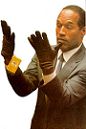 O.J. Simpson (1947-) Trying on Gloves, Sept. 28, 1995