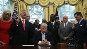 Pres. Trump praying with evangelicals in White House
